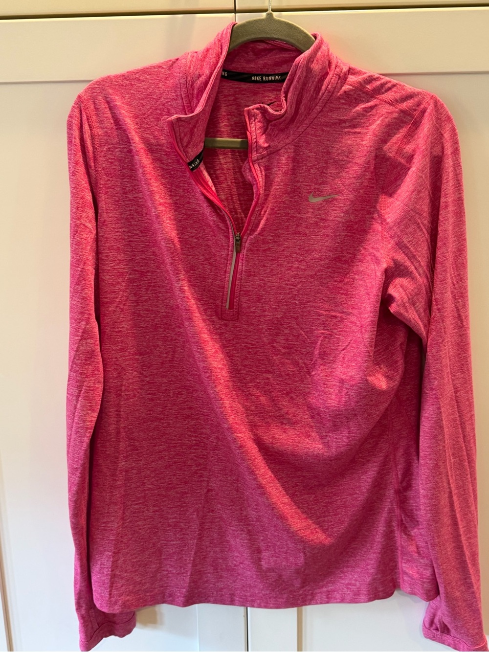 Women's pink Nike Dri-Fit half-zip top